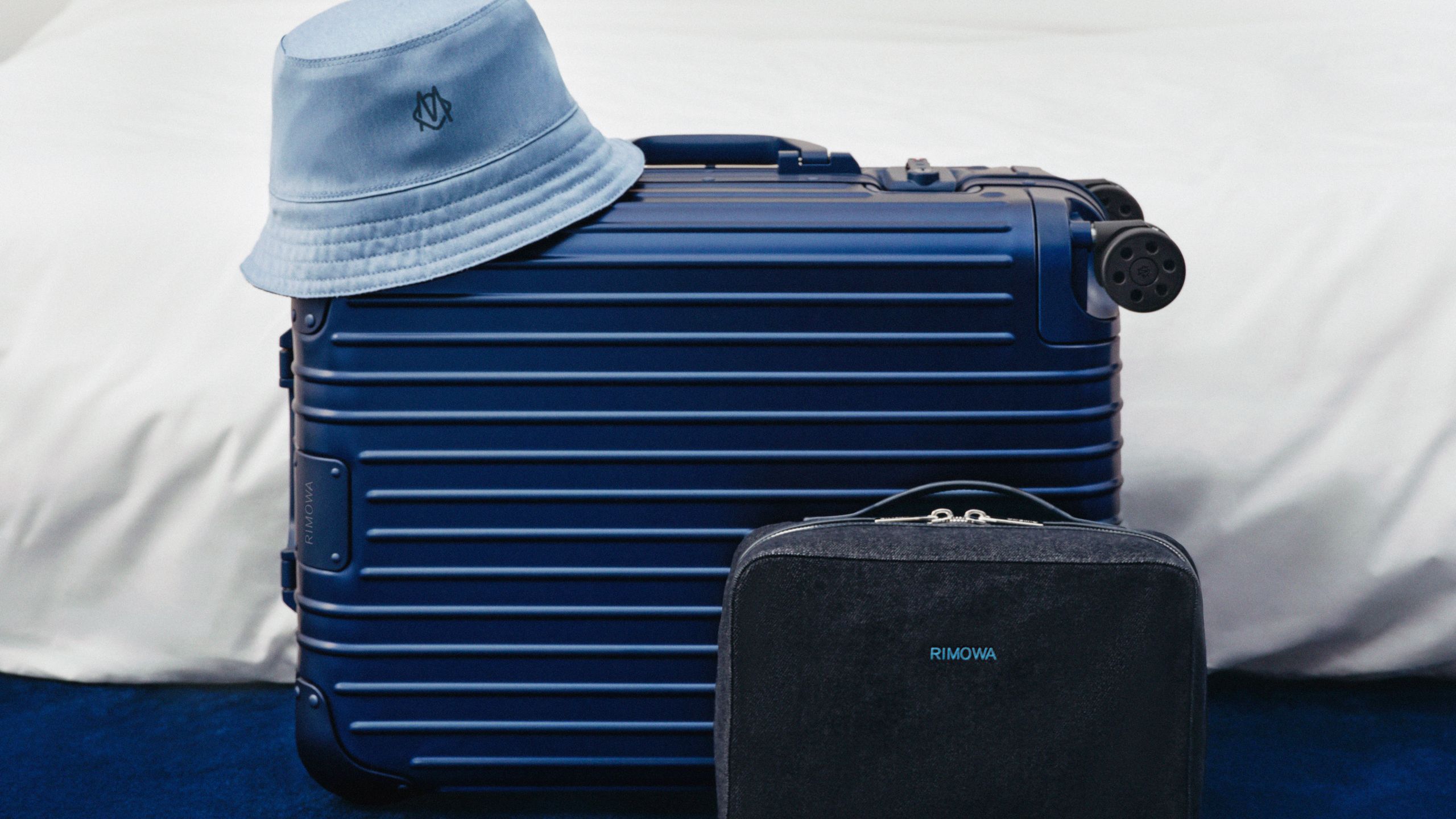 Rimowa Original suitcase collection in deep Ink Blue metallic finish